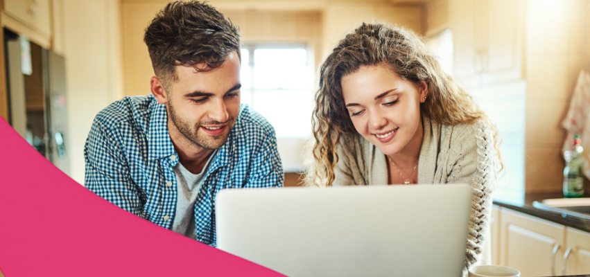 A male and female couple checking credit score